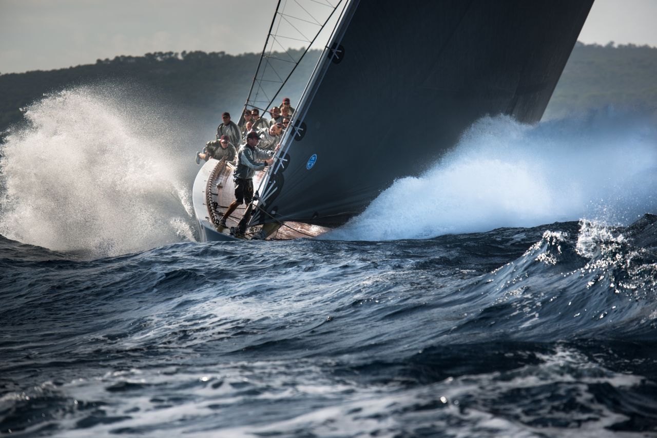 Windy and tough conditions at the Voiles de Saint-Tropez with the C Class boat Ranger crashing through the waves and bearing down quickly on the boat with the photographer, who took the shot from about 20 meters away. 