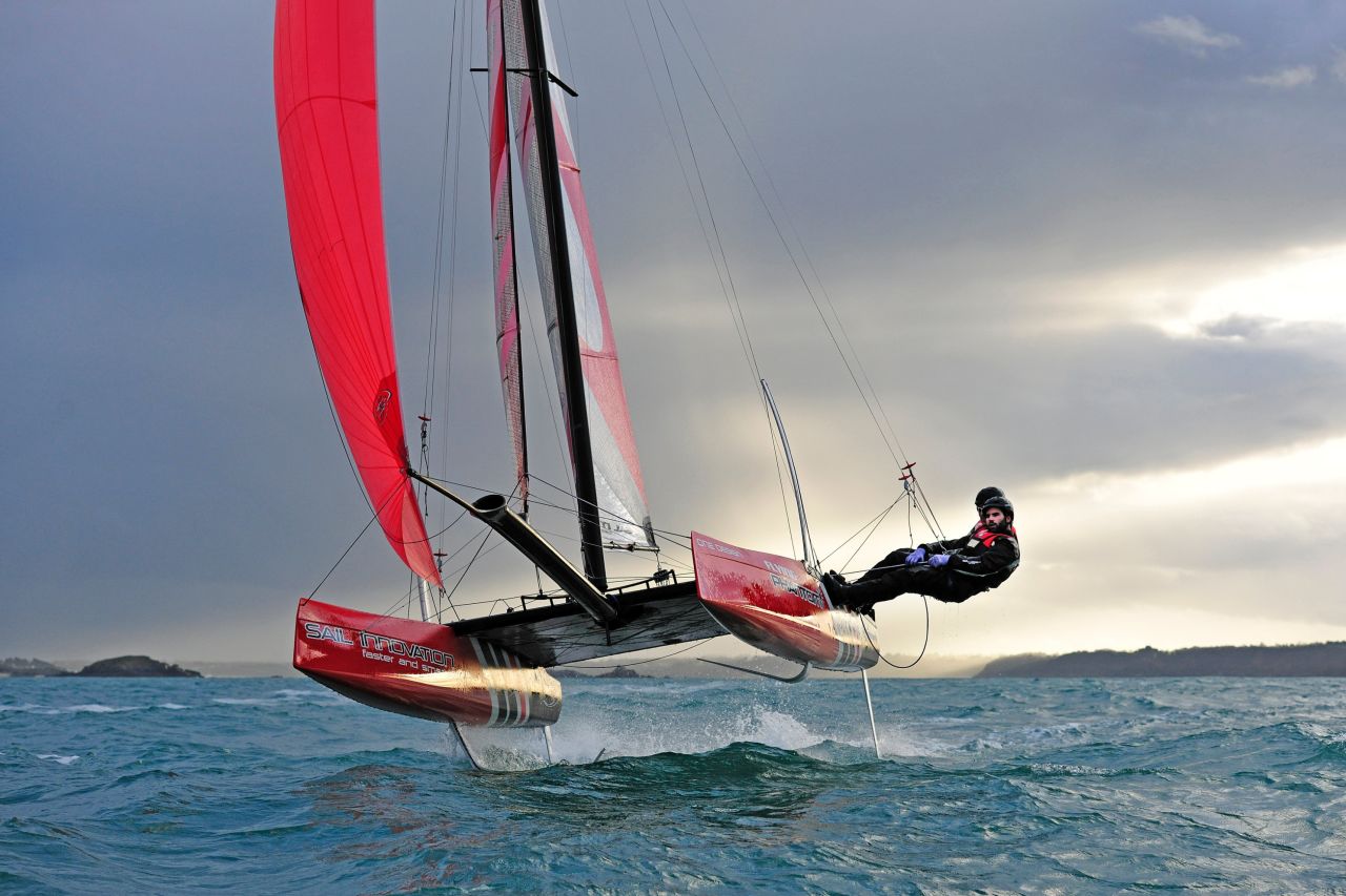 Gurvan Bontemps and Benjamin Amiot on Flying Phantom are captured against the winter afternoon sunshine while training off Saint Malo in France. 