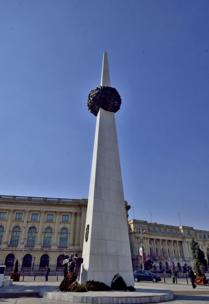A monument symbolizing the collapse of communism stands in Romania's Revolution Square, where hundreds were shot dead just a few days before Ceausescu's demise.