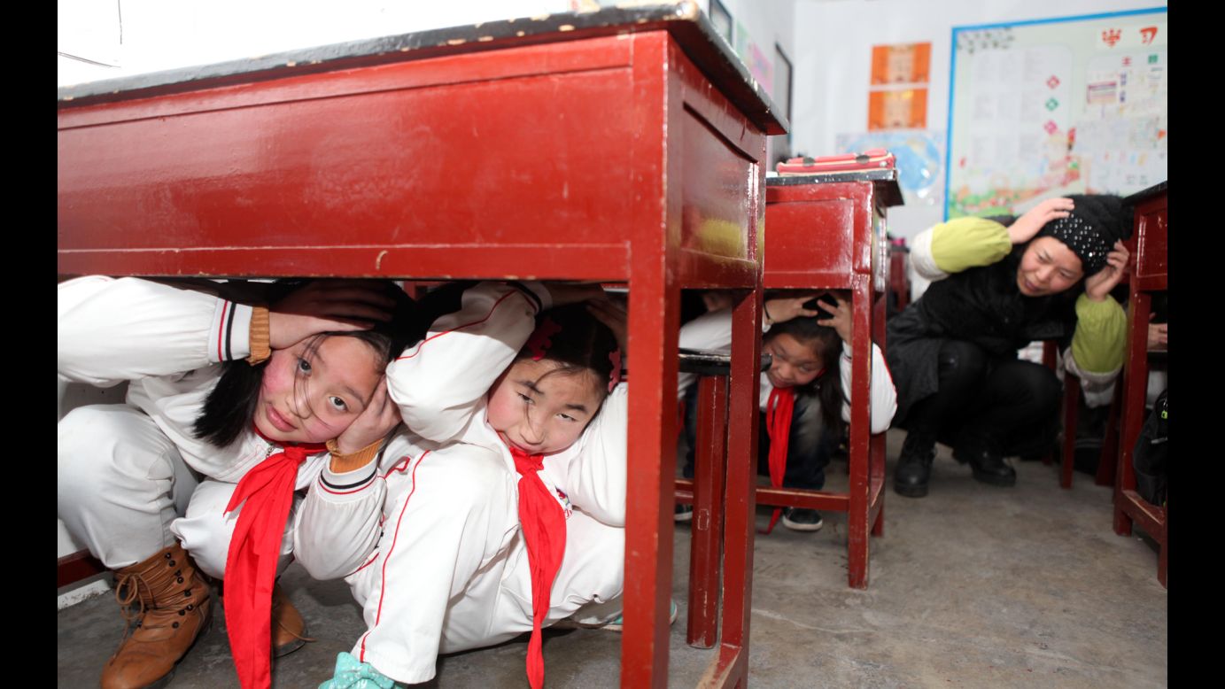 <strong>February 17:</strong> Children learn about disaster survival at the Hongzhuan Primary School in Chongqing, China.