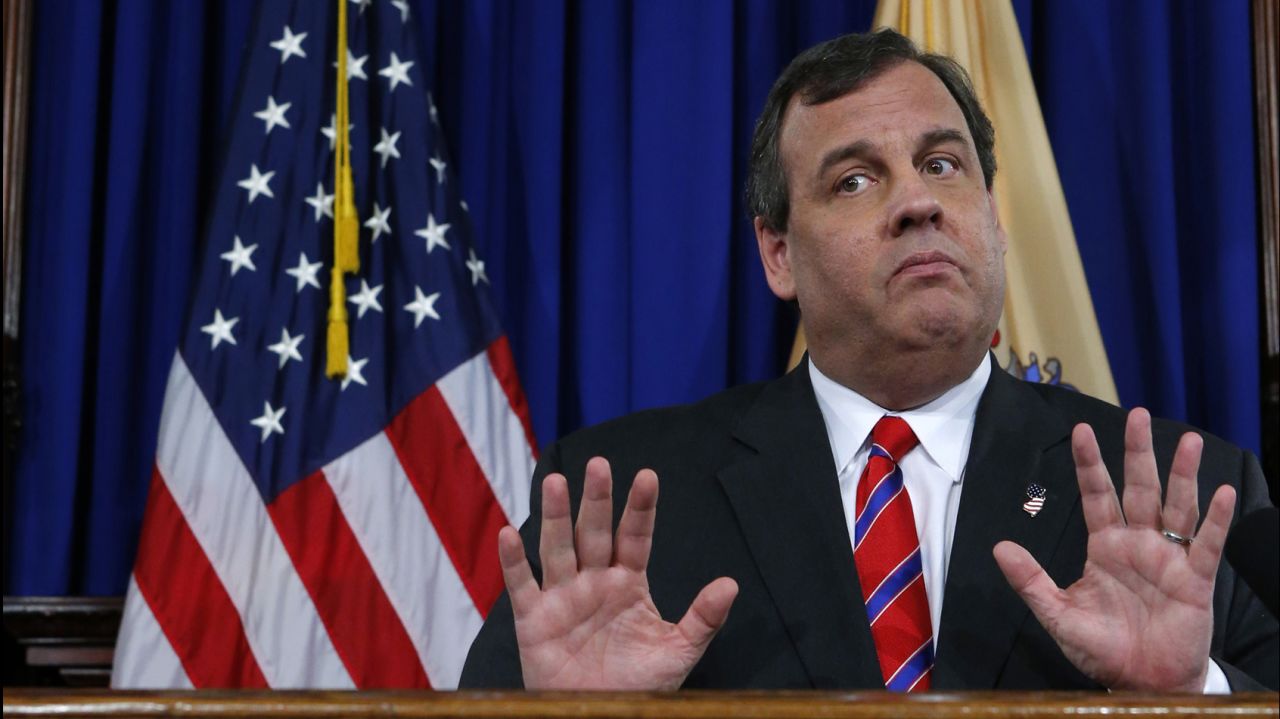 <strong>March 28:</strong> New Jersey Gov. Chris Christie reacts to a question during a news conference in Trenton, New Jersey. Christie announced that <a href="http://politicalticker.blogs.cnn.com/2014/03/28/another-key-christie-ally-leaves-his-job-amid-scandal/">David Samson, the chairman of the Port Authority of New York and New Jersey, had resigned.</a> The resignation was the latest fallout from the George Washington Bridge lane closures that snarled traffic on the New Jersey side and led to allegations of political retribution. Christie repeatedly cited a report he commissioned that cleared him of any role in the traffic jams.