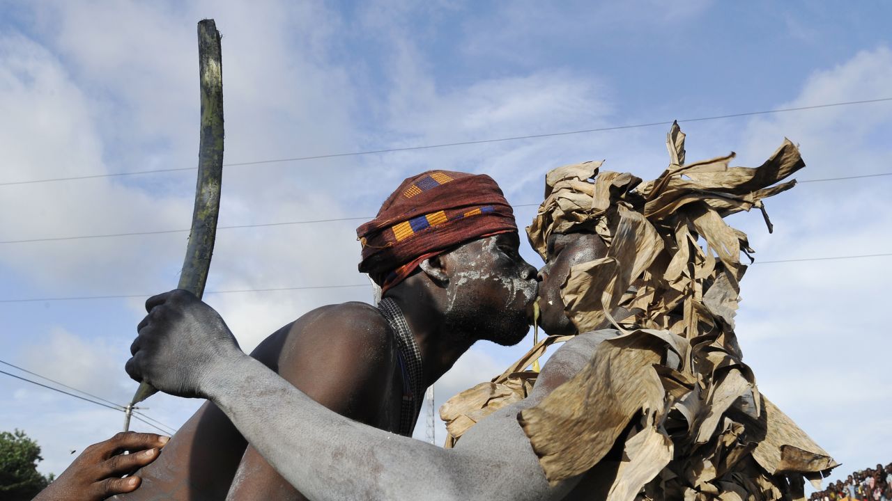 <strong>May 3:</strong> Youths from the Aboure tribe perform a warrior dance as they take part in a parade on the last day of the Popo carnival in Bonoua, Ivory Coast. This year's festival promoted national reconciliation.