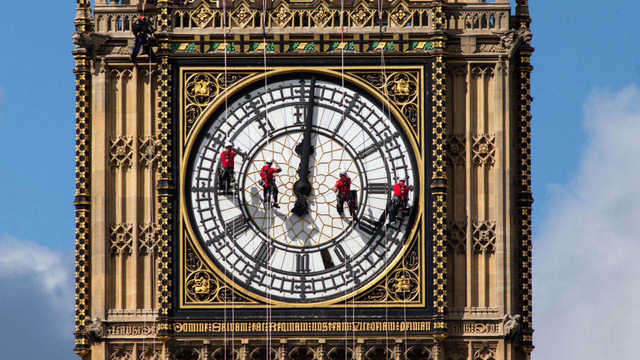 <strong>August 19:</strong> Workers clean the south face of Big Ben, the famous landmark at London's Palace of Westminster.