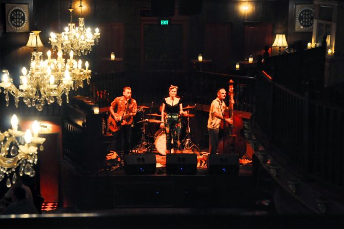 The two-story bar features live band performances daily.