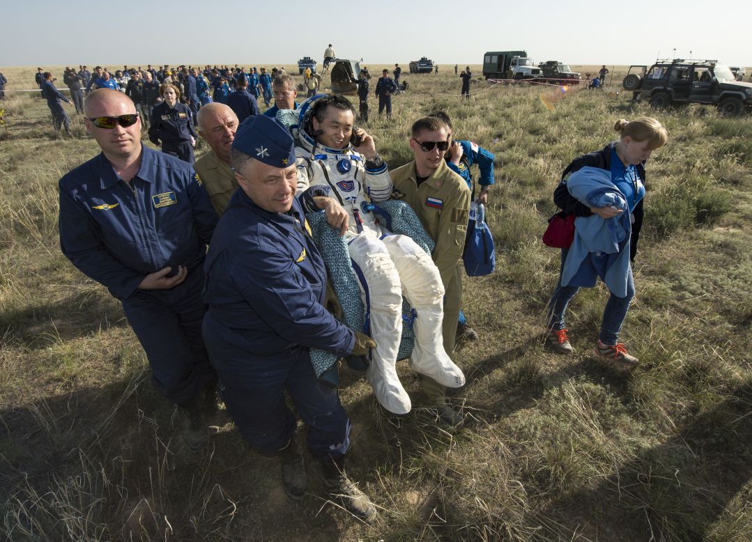 <strong>May 14:</strong> Astronaut Koichi Wakata is carried to a medical tent just minutes after he and two others landed in Kazahkstan on their return to Earth. Wakata, Mikhail Tyurin and Rick Mastracchio spent more than six months aboard the International Space Station.