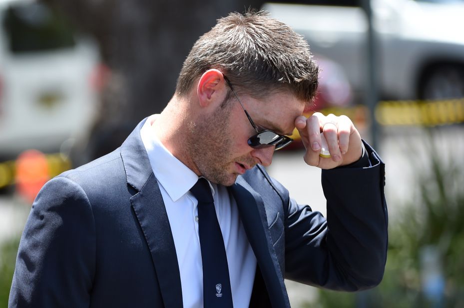 Australian Test cricket captain Michael Clarke reacts as he arrives for the funeral of Australian batsman Phil Hughes in his hometown of Macksville in northern New South Wales on December 3, 2014. Hughes died November 27, two days after being hit by a cricket ball during a match.