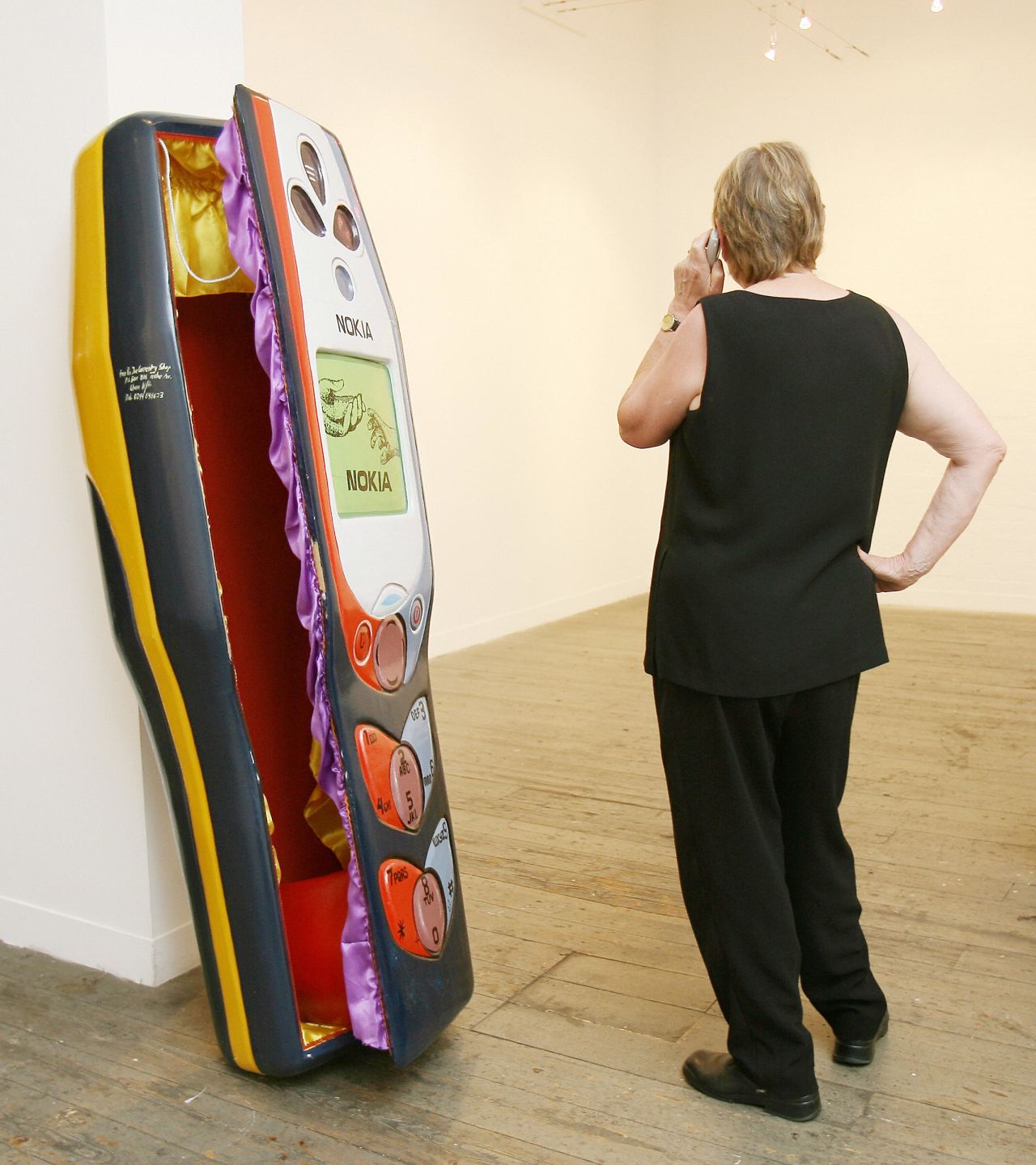 Another of Paa Joe's creations, a coffin carved in the shape of a mobile phone also at the Melbourne Festival in 2006. 