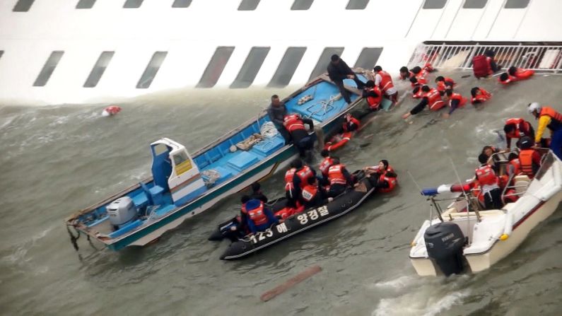 <strong>April 16:</strong> Rescue boats scramble to save passengers from the sinking ferry Sewol as it sinks into freezing waters off South Korea's southwestern coast. More than 300 people died <a href="http://www.cnn.com/2014/04/15/asia/gallery/south-korea-sinking-ship/index.html">after the ferry capsized,</a> and the ship's captain was later sentenced to 36 years in jail.