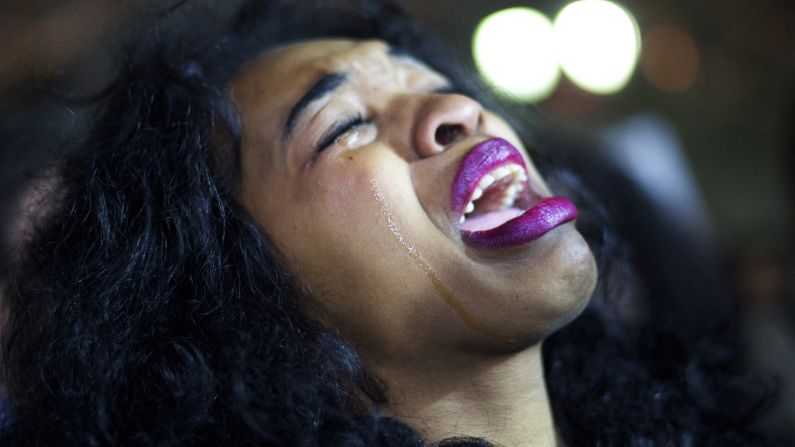 A demonstrator cries at a protest in Philadelphia on December 3.