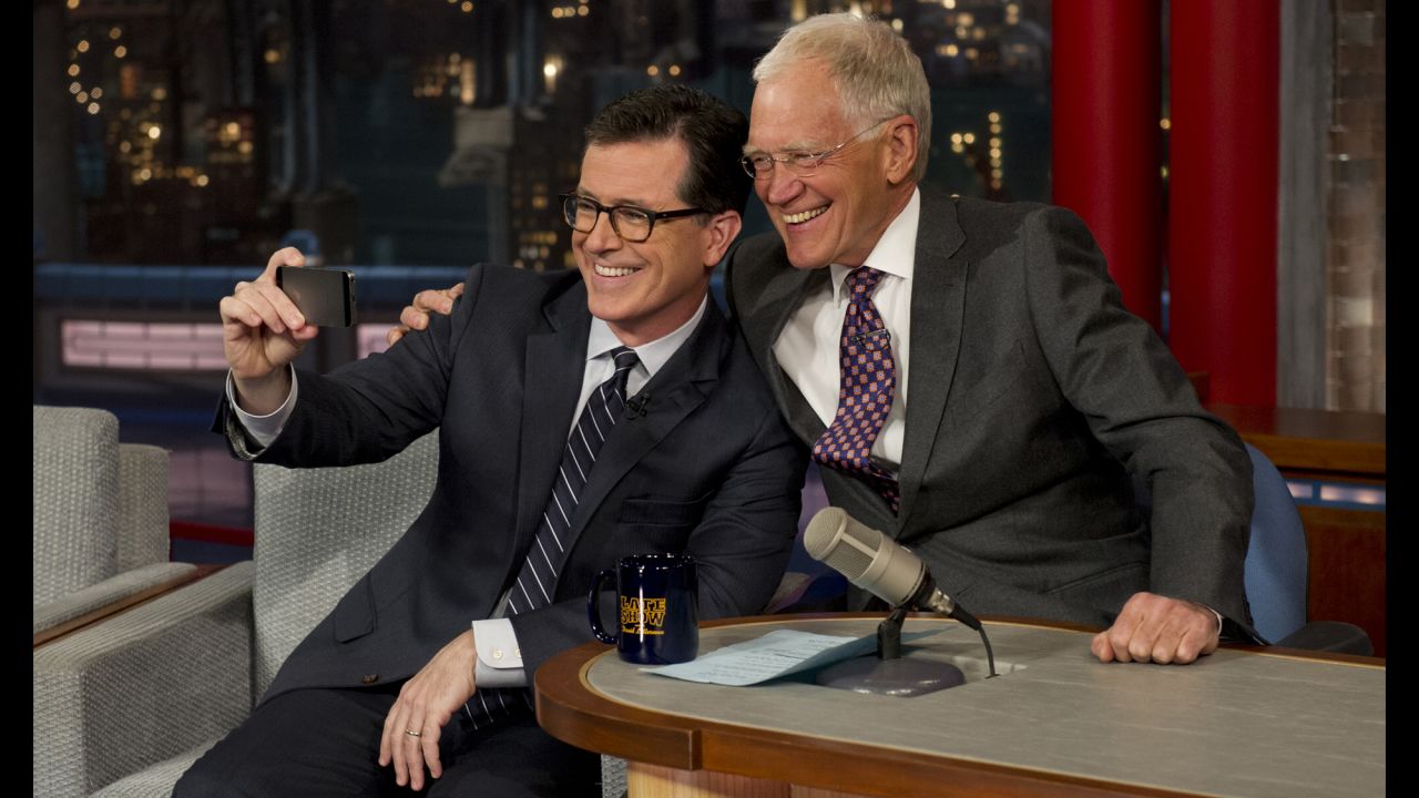 Funnyman Stephen Colbert, left, takes a selfie with David Letterman on the "Late Show with David Letterman" on Tuesday, April 22. It was Colbert's first visit to the show since CBS announced <a href="http://www.cnn.com/2014/04/10/showbiz/gallery/stephen-colbert/index.html">Colbert would succeed Letterman</a> when Letterman retires in 2015.