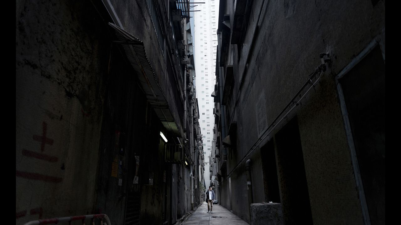 Walking between buildings in Hong Kong.