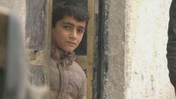 pkg paton walsh syria kobani survivors_00005410.jpg