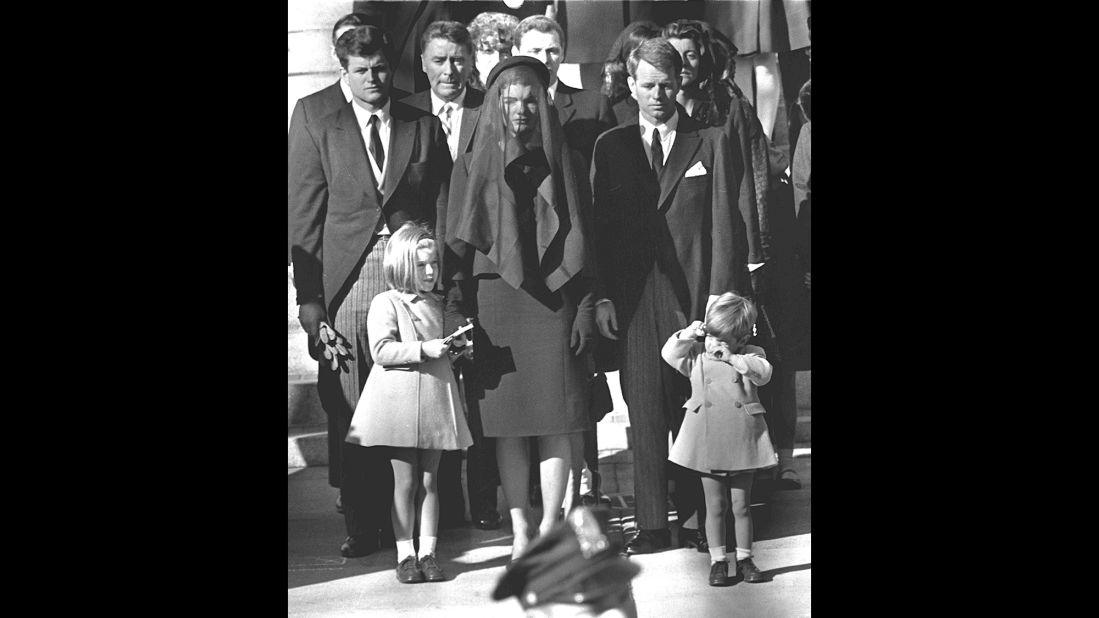 Jackie stands with her two children and her brothers-in law Ted Kennedy and Robert Kennedy at the funeral of her husband on November 26, 1963.