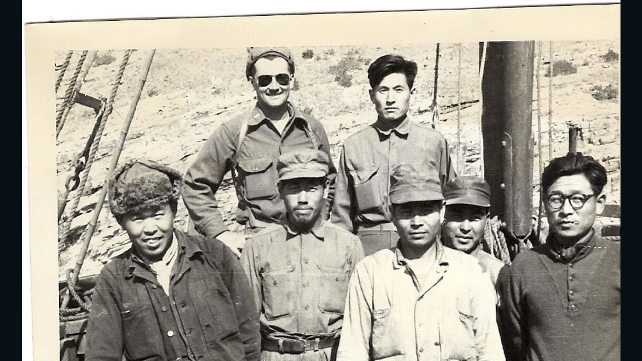Merrill Newman (back, left), pictured in with the "Kuwol Comrades," anti-communist Korean guerrillas who fought behind North Korean lines.