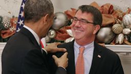 WASHINGTON, DC - DECEMBER 05: U.S. President Barack Obama (L) jokes with Ashton Carter after Obama announced his nomination of Carter to be the next defense secretary in the Roosevelt Room at the White House December 5, 2014 in Washington, DC. Carter, who served as the second in charge at the Pentagon under both secretaries Leon Panetta and Chuck Hagel, is expected to face a smooth confirmation process in the U.S. Senate. (Photo by Chip Somodevilla/Getty Imag