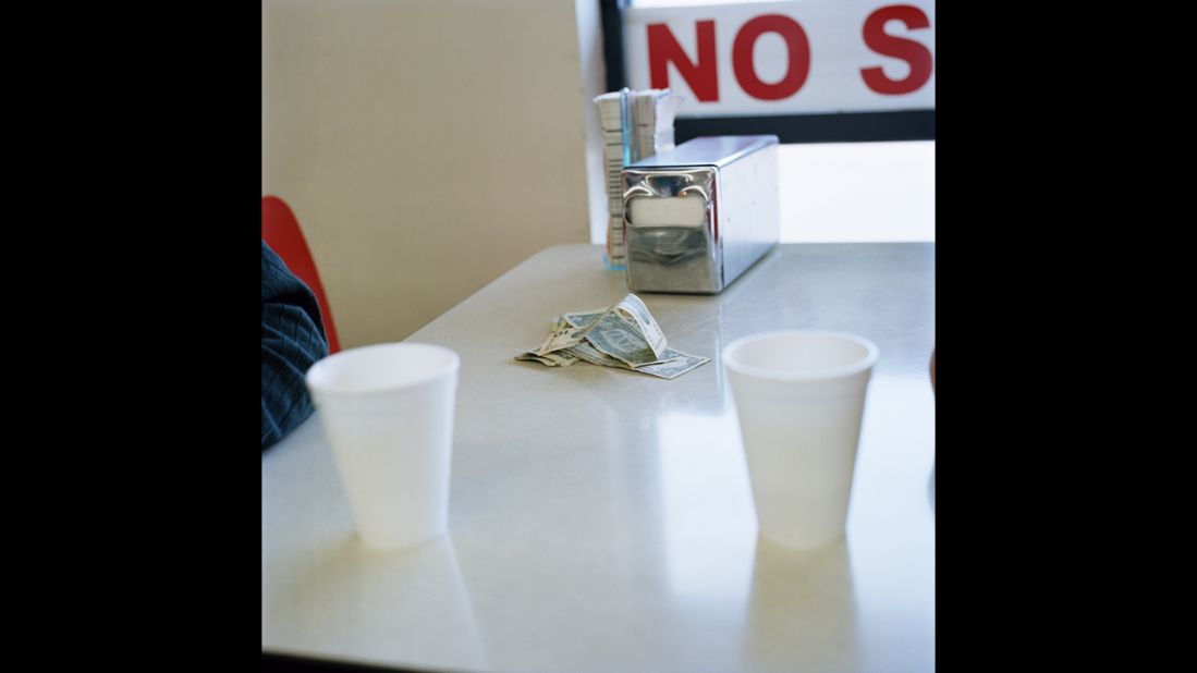 Money sits on the table after Herb Lindsay and Leon Mace finished their morning coffee at a nearby convenience store.