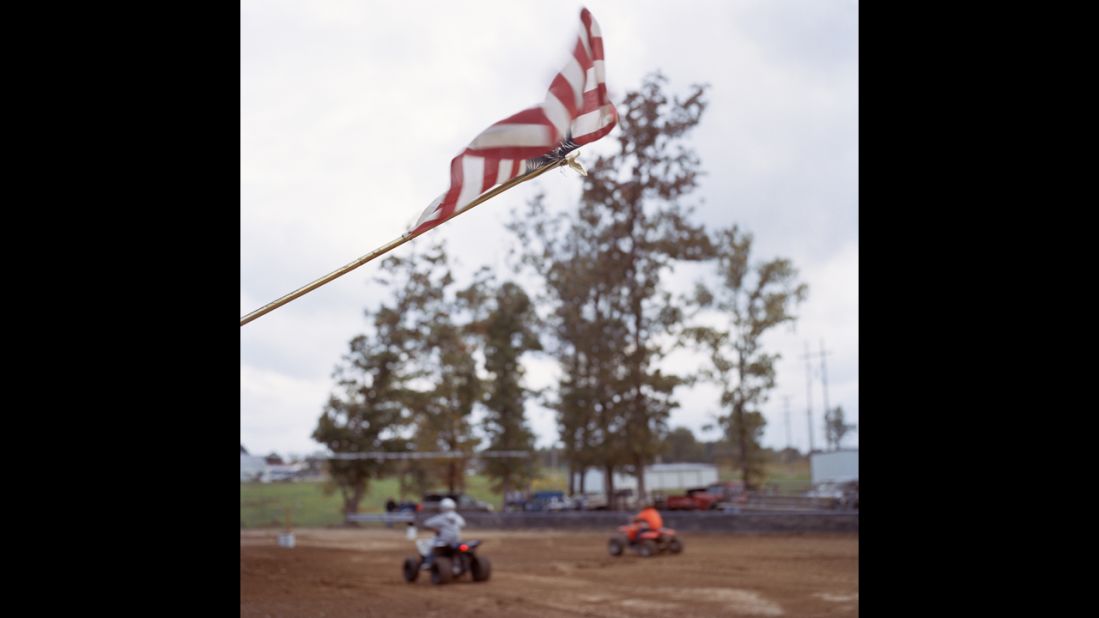 An American flag flaps in the wind during an ATV Rodeo in nearby Roby, Missouri.