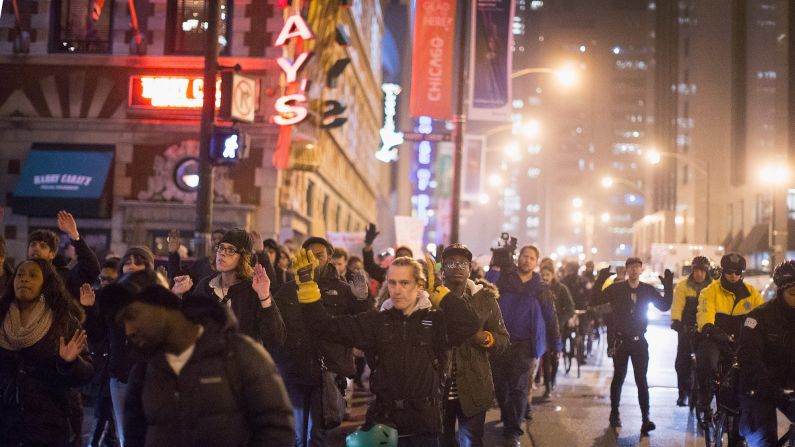 Demonstrators march through the Loop in Chicago on December 5.