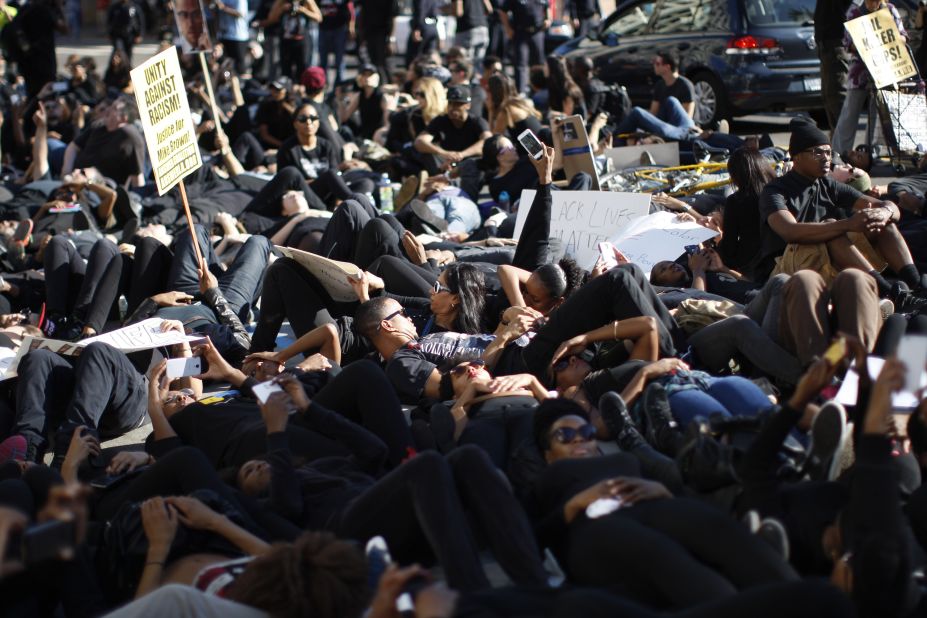 People in Los Angeles lie down during a "die-in" on Hollywood Boulevard on December 6.