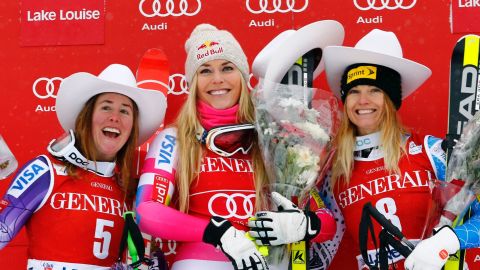 Lindsey Vonn is flanked by Stacey Cook (left) and Julia Mancuso as the U.S. swept the podium in Lake Louise.