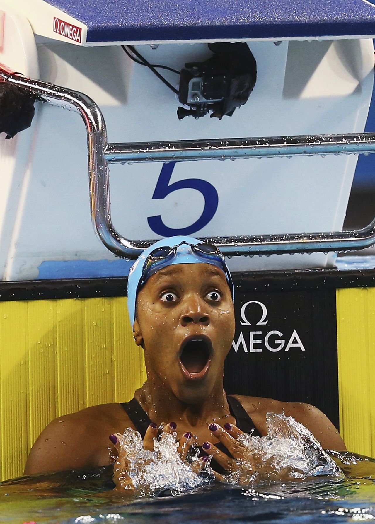 A look of disbelief is etched on the face of <a href="http://www.cnn.com/2014/12/07/sport/swimming-atkinson-world-first/index.html" target="_blank">Alia Atkinson after she claims gold in the women's 100m breaststroke </a>at the world short course swimming championships in Qatar.  The win made her the first black woman swimmer to claim the world title.  Click through the gallery for more female sports firsts: