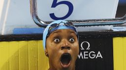 A look of disbelief on the face of Alia Atkinson after she claimed gold in the women's 100m breaststroke on Qatar.