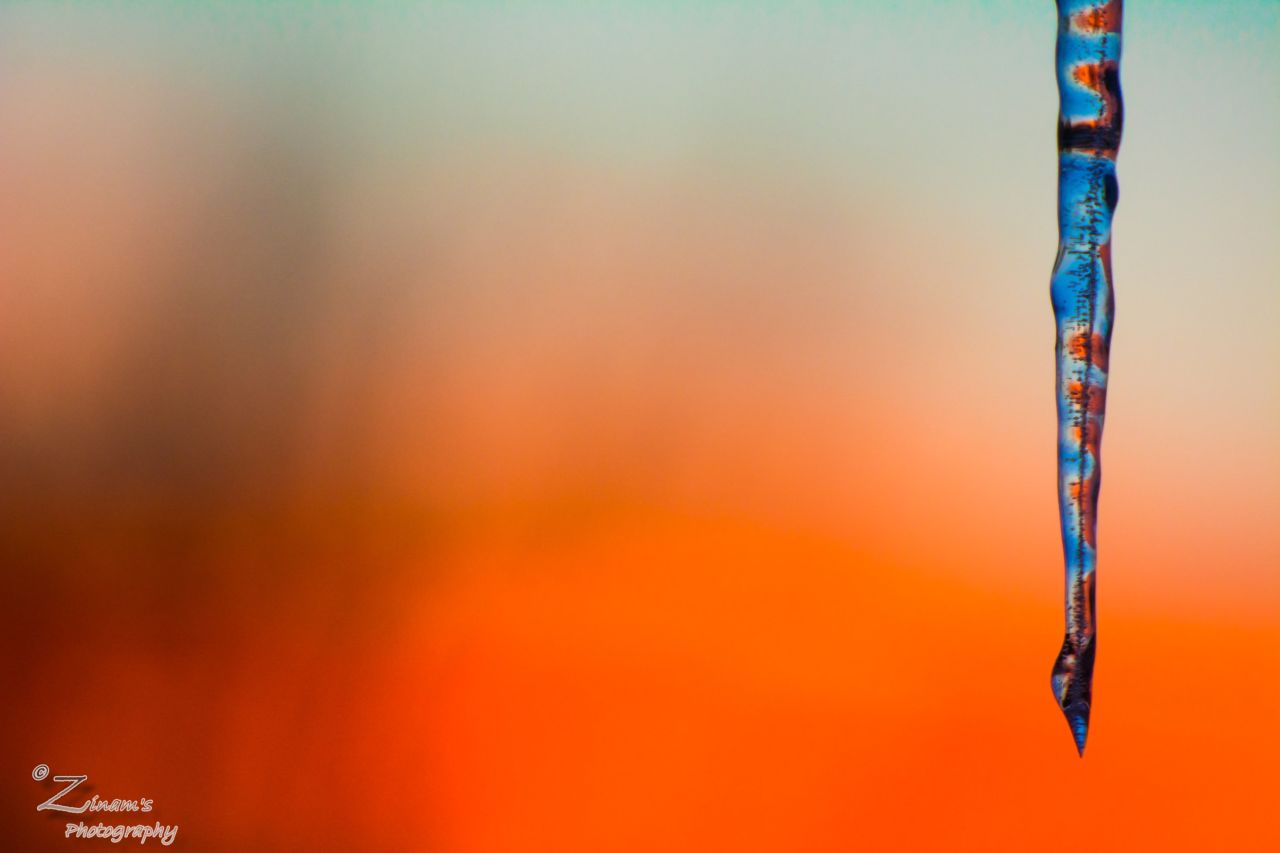 After a winter storm in Columbus, Indiana, <a href="http://ireport.cnn.com/docs/DOC-1068450">Adam Aniz Sarbudeen</a> captured this colorful sunset as seen through an icicle.