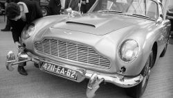  Picture dated 01 October 1964 shows the Aston Martin D.B.5 of the James Bond film 'Goldfinger' is presented during the Motor show in Paris. The Ford Motor Company has agreed to sell its iconic Aston Martin brand for just over 470 million pounds (908 million dollars) to a British-led consortium, the US firm said Monday 12 March 2007. The luxury car maker, famous for its long-running association with the James Bond blockbuster films, is to be sold to a group of investors led by British motor sport chief Dave Richards, a Ford official announced. 