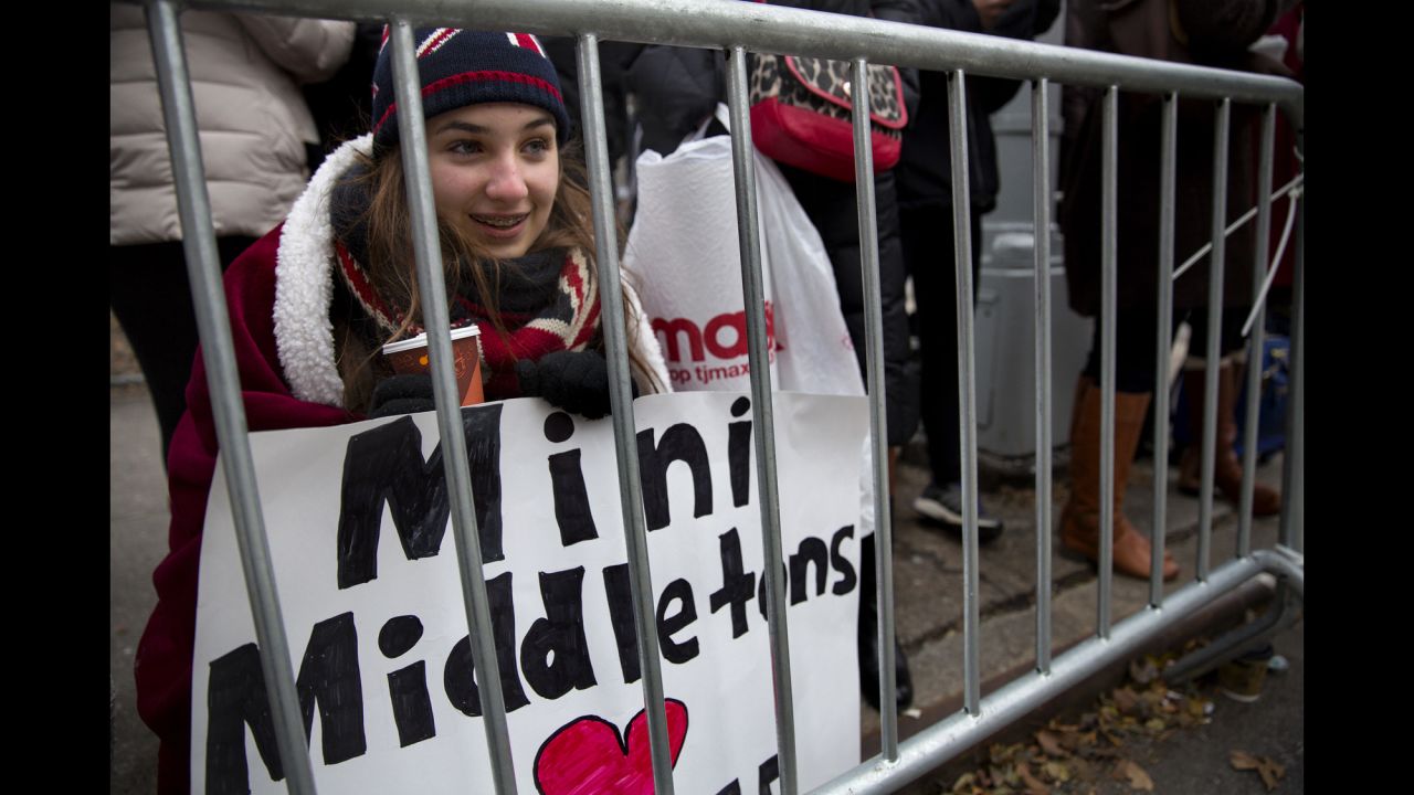 Lauren Nichols, of Chardon, Ohio, huddles in the cold while she waits to see the duchess December 8 in New York.