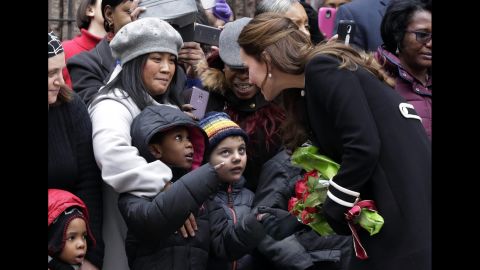 Kate greets children outside of the Northside Center on December 8.