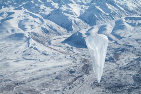 Project Loon is an initiative launched by Google in 2013, which aims to connect the planet by beaming internet signals from high-altitude balloons like this one floating above snow-covered peaks on New Zealand's South Island. 