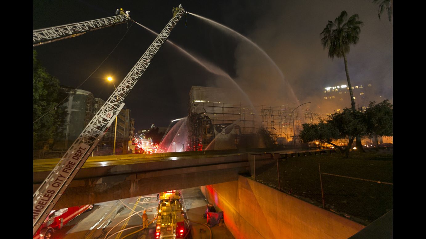Los Angeles County firefighters battle the blaze.