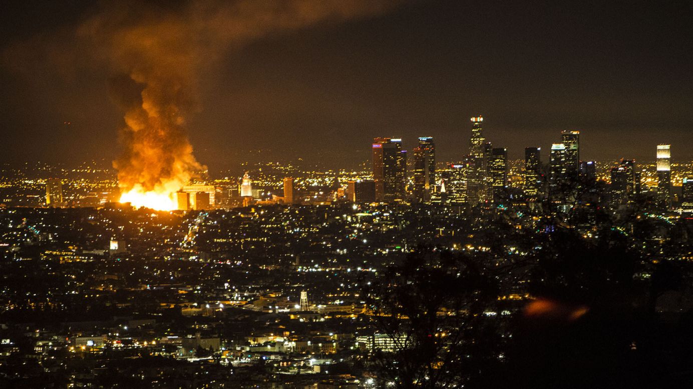 A massive fire engulfs an apartment building that was under construction Monday, December 8, in Los Angeles.