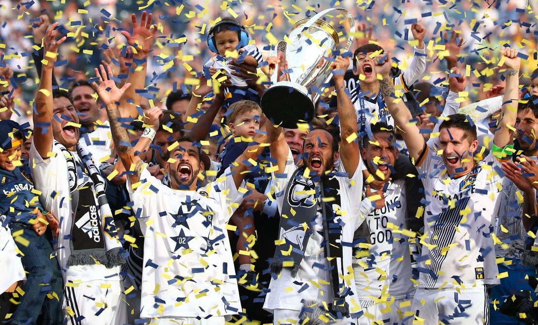Landon Donovan raises the MLS Cup for the sixth -- and last -- time following LA Galaxy's 2014 victory over New England Revolution. 
