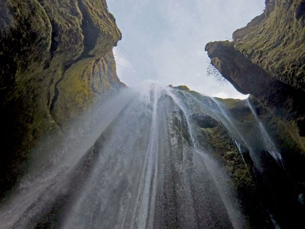 Close to Seljalandfoss, the waterfall of Gljufrabui is hidden in a mossy grotto.