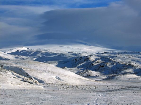 Seen here shrouded in snow, the top of Eyjafjallajokull is best reached by snowmobile or quadbike. 