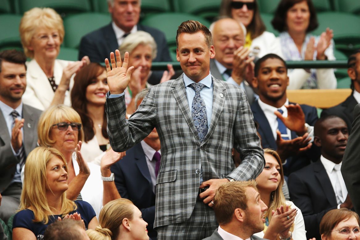Away from the course, the 38-year-old is still a natty dresser, as proved by this appearance at Wimbledon in 2014.