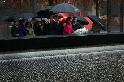 The royal couple lay a wreath at one of the reflecting pools of the National September 11 Memorial and Museum on December 9.