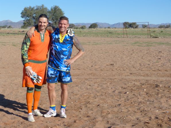 Pfannenstiel, here with former Dortmund striker Martin Driller, has taken his team, Global United, across the world. His team has play matches and raised awareness of HIV and famine while in Africa.