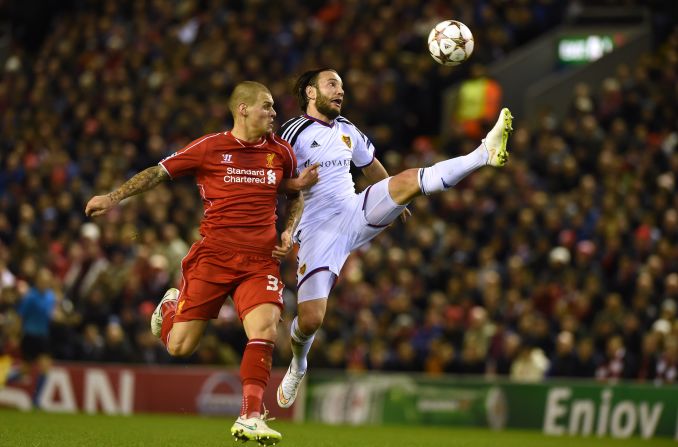 Shkelzen Gashi of Basel and Martin Skrtel of Liverpool endured a fierce contest with both sides desperate to make it through to the knockout phase.