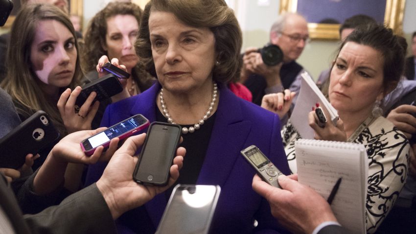 Senate Intelligence Chairwoman Dianne Feinstein (C), a Democrat from California, speaks to reporters about the committee's report on CIA interrogations at the US Capitol in Washington, DC, December 9, 2014. The CIA's interrogation of Al-Qaeda suspects was far more brutal than acknowledged and did not produce useful intelligence, a damning and long-delayed US Senate report said Tuesday. The Central Intelligence Agency also misled the White House and Congress with inaccurate claims about the program's usefulness in thwarting attacks, the Senate Intelligence Committee said. AFP PHOTO / SAUL LOEB (Photo credit should read SAUL LOEB/AFP/Getty Images)