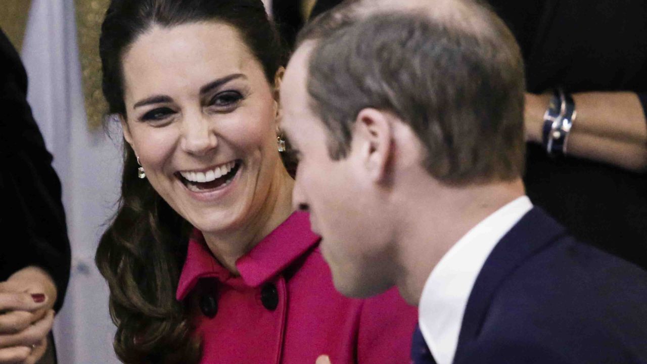 The Duchess of Cambridge smiles as she and Prince William visit the The Door and the City Kids Foundation on December 9.