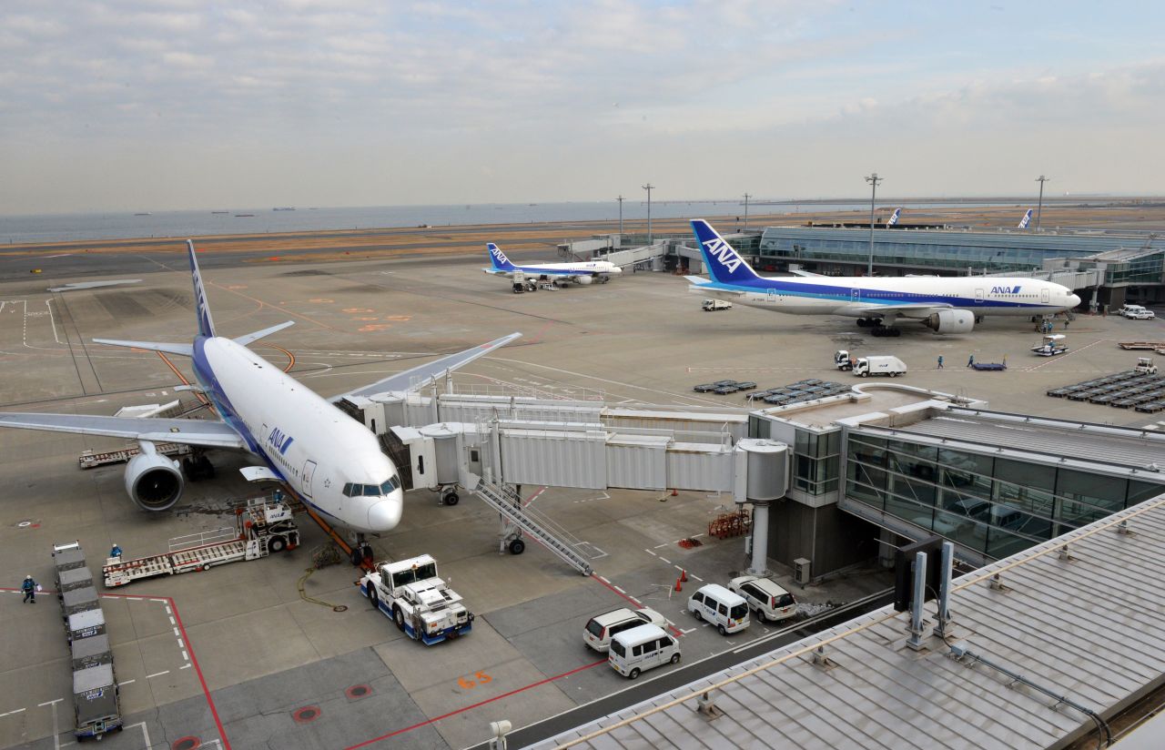 Tokyo's Haneda airport on January 16, 2013 after an ANA Dreamliner made an emergency landing. Smoke had been reported in the cockpit, which later turned out to be from an overheated battery. The Japanese incident and the Boston fire prompted a worldwide grounding of the entire Dreamliner fleet -- which numbered 50 aircraft at the time. 