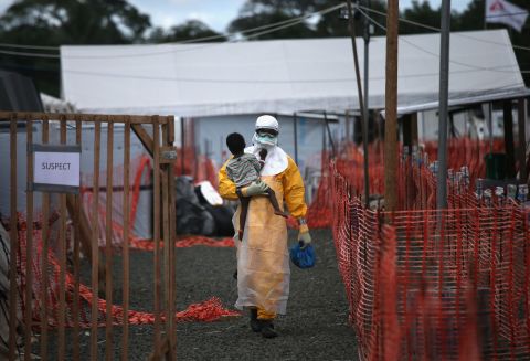 In October, a Doctors Without Borders health worker carries a child suspected of having Ebola in Liberia. Nonprofits often have to fill in the gaps in West Africa, where the health care system was <a href="http://kff.org/global-indicator/health-expenditure-per-capita/" target="_blank" target="_blank">extremely limited even before the epidemic.</a> Because of civil wars and extreme poverty, there aren't enough doctors: Liberia has 0.014 physicians per 1,000 people, Sierra Leone has 0.022 and Guinea has 0.1. In contrast, the United States has 2.5 doctors per 1,000 people. 