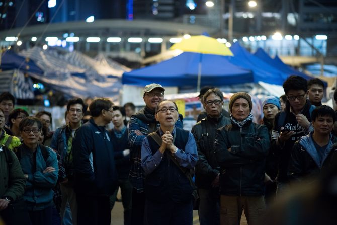 A crowd listens to a speaker at the main Hong Kong protest site in Admiralty on Tuesday, December 9.