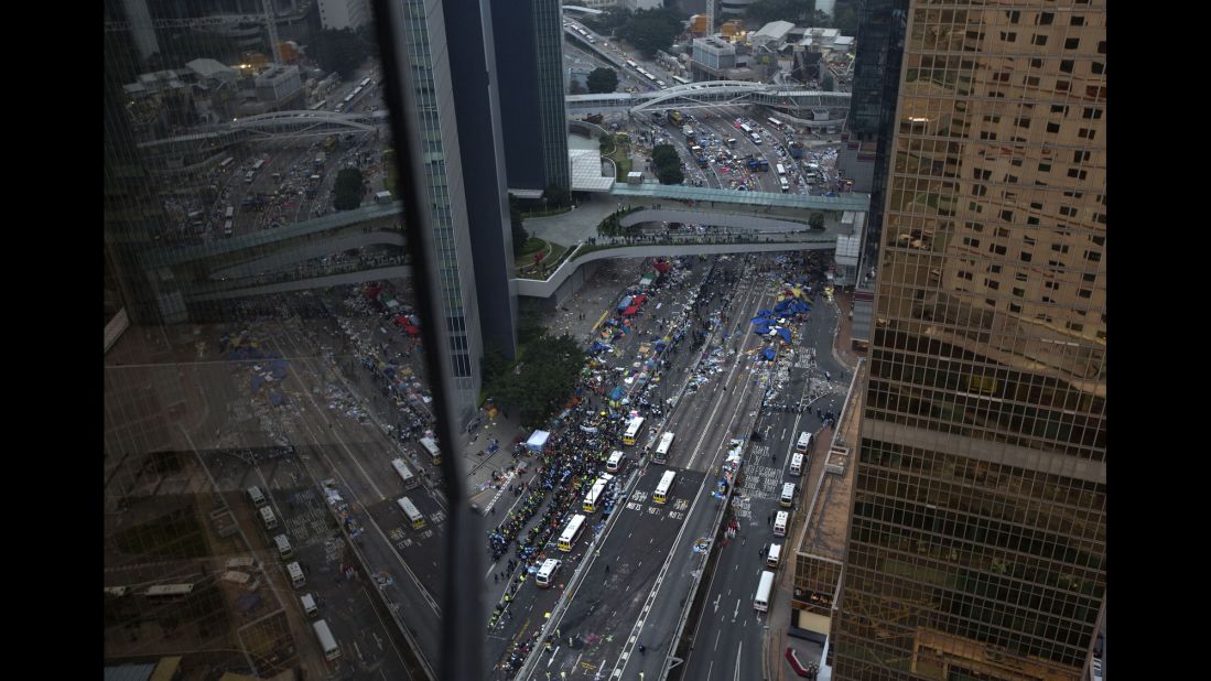 Police remove barricades and tents outside government headquarters in Hong Kong on Thursday, December 11, 2014. The main site of pro-democracy protests for the past two months was broken down piece by piece, and police dragged out the last remaining demonstrators one by one.