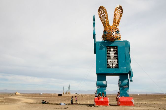 The gigantic sculptures and bodypainted revelers resemble props and extras from dozens of different movie sets.