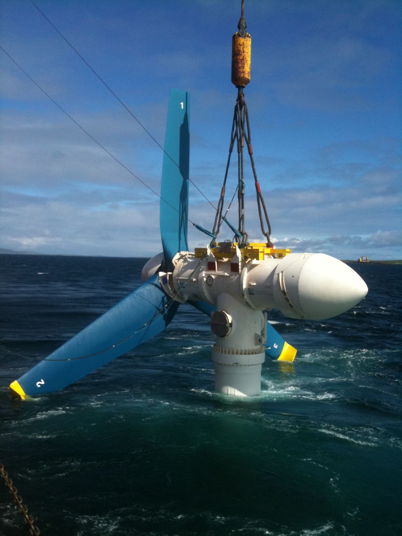 A turbine is lowered into place in water in the north of Scotland. The waters around the region of John O'Groats, at the nothernmost tip of the United Kingdom, produce powerful tidal surges twice a day. 
