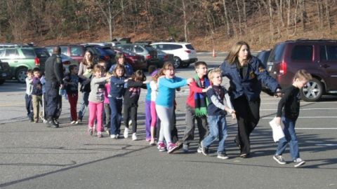 Police evacuate children from Sandy Hook Elementary School in Newton in 2012.