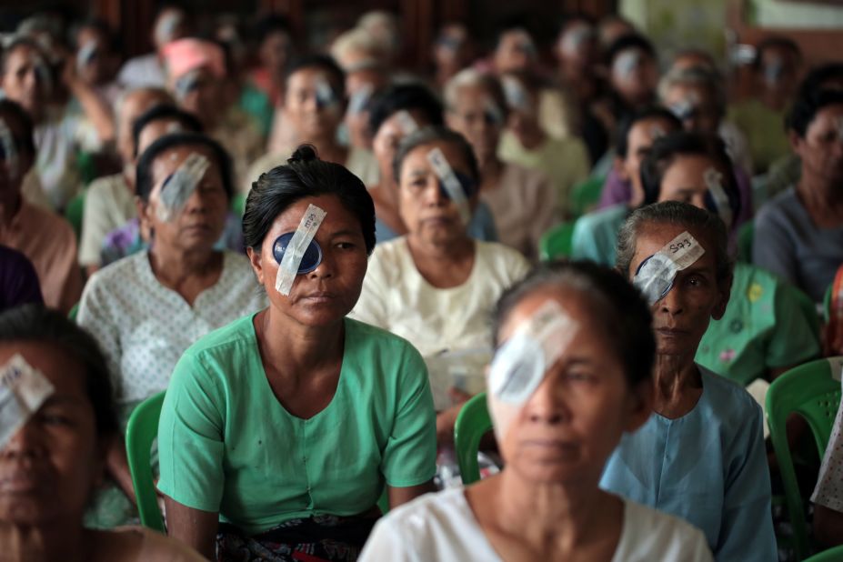 Women in the Myanmar Outreach Eye Clinic in Yangon wait for their eyes to be examined after cataract surgery in 2013.